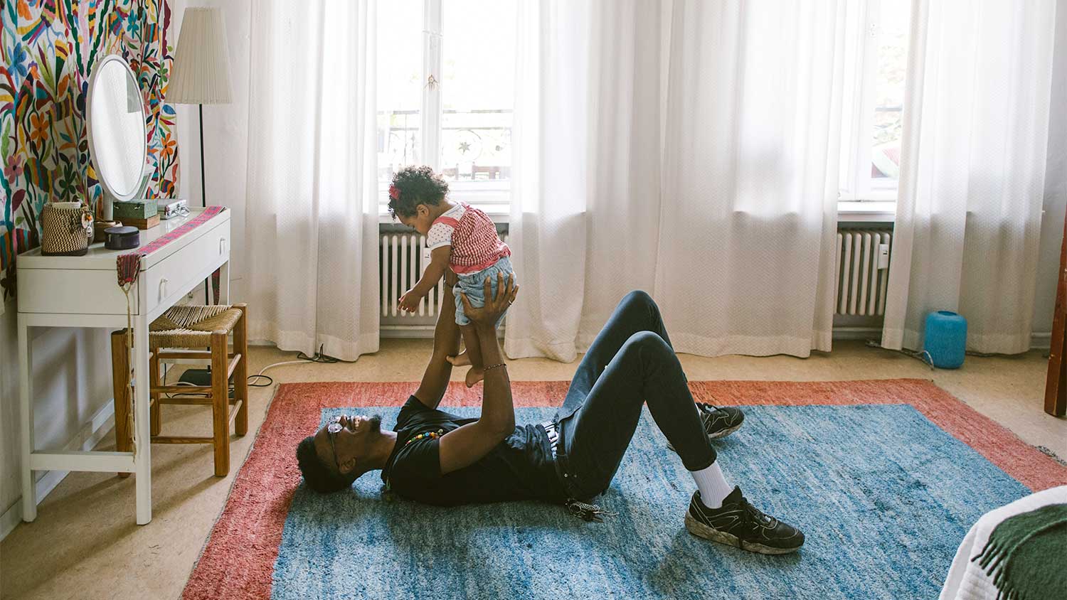 Father and child playing at home